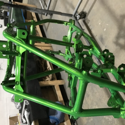 car parts powder coating motorcycle frames bright green
