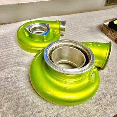 Turbos powder coated with polished aluminum base coat and prismatic shower yellow candy top coat